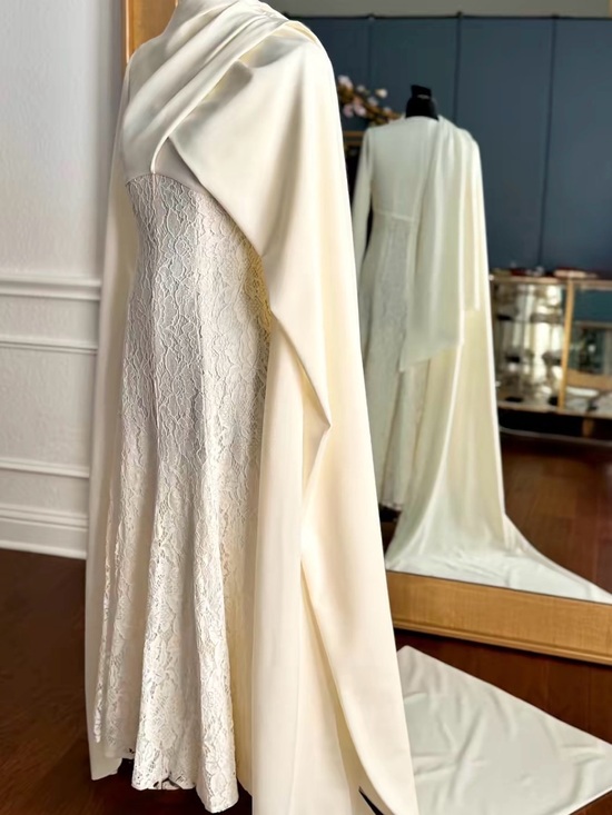 Dresses & Skirts - Elegant Ivory Lace Gown with Draped Cape